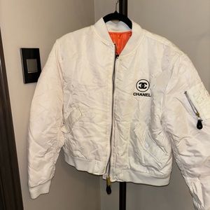 Vintage Chanel bomber jacket in white. Fits oversized and never worn!